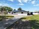 Inviting single-Gathering home with updated exterior, carport, and scenic lake views at 2350 Crump Rd, Winter Haven, FL 33881