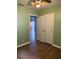 Bedroom with laminate floors, neutral paint, and ceiling fan at 253 Walter Ave, Frostproof, FL 33843
