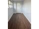 Inviting entryway with laminate flooring, and a stylish front door with decorative glass at 253 Walter Ave, Frostproof, FL 33843