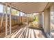 Covered patio with tile flooring, views of the backyard and a nice breeze at 3027 Maplewood Ave, Lakeland, FL 33803