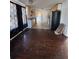 An empty living room leads to the kitchen and laundry area at 334 Main St, Haines City, FL 33844