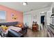 Comfortable bedroom with a daybed, closet, and modern wood-look flooring at 3608 Garrard Rd, Fort Meade, FL 33841