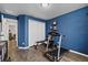 Versatile room with a treadmill, weights, large closet, and contemporary flooring at 3608 Garrard Rd, Fort Meade, FL 33841