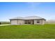 Well-maintained, single story home featuring a front-facing two car garage and covered entry way at 3608 Garrard Rd, Fort Meade, FL 33841