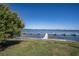 Community dock with multiple boat slips and calm water views at 398 Winter Ridge Blvd # 398, Winter Haven, FL 33881