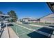 Community shuffleboard courts feature sun protection and bench seating at 398 Winter Ridge Blvd # 398, Winter Haven, FL 33881