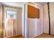 Small room or closet featuring a wall mounted pegboard and a small window at 398 Winter Ridge Blvd # 398, Winter Haven, FL 33881