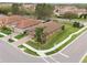Aerial view of a beautiful property showcasing its landscaping, and proximity to neighborhood amenities at 4004 Prima Lago Cir, Lakeland, FL 33810