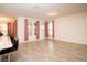 Bright dining area with tile flooring, soft natural light, and a view of the outdoor patio at 4004 Prima Lago Cir, Lakeland, FL 33810