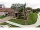 Attractive single-story home showcasing manicured landscaping and a brick driveway at 4004 Prima Lago Cir, Lakeland, FL 33810