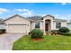 Charming single-story home featuring a well-maintained lawn and inviting curb appeal at 4009 Bedford Ave, Winter Haven, FL 33884
