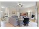Spacious living room with tile flooring, comfortable furniture, and modern decor at 4009 Bedford Ave, Winter Haven, FL 33884