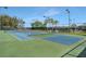 Play tennis on this community court with well-maintained surface, lighting, and perimeter fencing at 4009 Bedford Ave, Winter Haven, FL 33884