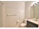 Bathroom featuring a dark vanity with white countertop and a toilet at 404 Laurel Cove Way # 404, Winter Haven, FL 33884