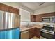 Modern kitchen with stainless steel appliances, and a window offering natural light at 404 Laurel Cove Way # 404, Winter Haven, FL 33884