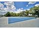 Well-maintained community tennis court provides an excellent recreational amenity for residents at 404 Laurel Cove Way # 404, Winter Haven, FL 33884