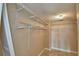 Spacious walk-in closet featuring wire shelving, providing ample storage and organization solutions at 404 Laurel Cove Way # 404, Winter Haven, FL 33884