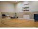 Indoor basketball court with hardwood floors, hoop, and additional space for exercise and activities at 4168 Aberdeen Ln, Lake Wales, FL 33859