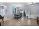 Dining room with light blue walls, modern chandelier, and front door access at 4168 Aberdeen Ln, Lake Wales, FL 33859