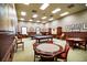 Entertaining game room with pool tables, card tables, and other amenities, perfect for leisure and recreation at 4168 Aberdeen Ln, Lake Wales, FL 33859