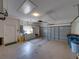 The garage features lots of storage, space for two cars, and a side entrance at 4168 Aberdeen Ln, Lake Wales, FL 33859