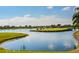 Picturesque golf course views with serene water features and manicured landscaping, perfect for a relaxing game at 4168 Aberdeen Ln, Lake Wales, FL 33859