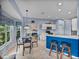 Bright kitchen and breakfast nook with breakfast bar seating, and modern appliances at 4168 Aberdeen Ln, Lake Wales, FL 33859