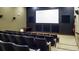 Cozy theater room with comfortable seating and a large screen, perfect for movie nights and entertainment at 4168 Aberdeen Ln, Lake Wales, FL 33859