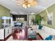 Bright and open floor plan with a dining area, living room and indoor palm at 4485 Turnberry Ln, Lake Wales, FL 33859