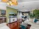 Open floorplan with a living room that connects to a dining area and kitchen at 4485 Turnberry Ln, Lake Wales, FL 33859