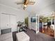 Cozy office with seating, television, and computer setup with a view to the living area at 4485 Turnberry Ln, Lake Wales, FL 33859