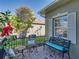 Cozy outdoor patio with wrought iron seating, creating a relaxing space at 4485 Turnberry Ln, Lake Wales, FL 33859