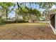 Expansive backyard offering plenty of space for outdoor activities and recreation at 4615 Reynosa Sw Dr, Winter Haven, FL 33880