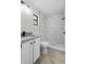 Modern bathroom featuring tile floors, vanity, and glass shower at 4615 Reynosa Sw Dr, Winter Haven, FL 33880