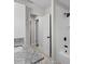 Bathroom featuring granite countertop, white cabinets, and a shower-tub combo at 4615 Reynosa Sw Dr, Winter Haven, FL 33880