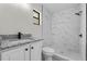 Beautiful updated bathroom with tiled shower and granite vanity at 4615 Reynosa Sw Dr, Winter Haven, FL 33880