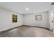 Bright bedroom with lots of windows and wood-look floors at 4615 Reynosa Sw Dr, Winter Haven, FL 33880