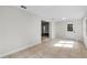 Bright living room with tile flooring and a view to other rooms at 4615 Reynosa Sw Dr, Winter Haven, FL 33880