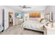 Cozy bedroom featuring neutral walls, plush carpet, and a stylish ceiling fan at 462 Lake View Way, Auburndale, FL 33823