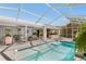 Enjoy the Florida sunshine in this large, screened pool area with outdoor dining and seating at 462 Lake View Way, Auburndale, FL 33823