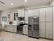 Well-equipped kitchen with stainless steel appliances and ample cabinet space at 5556 Hogan Ln, Winter Haven, FL 33884
