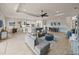 Light-filled living area connects to a gourmet kitchen, creating an ideal space for entertaining and everyday living at 5556 Hogan Ln, Winter Haven, FL 33884