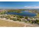 Scenic aerial view of the home's location near a lake, offering a sense of community and natural beauty at 633 Hart Lake Dr, Winter Haven, FL 33884