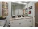 Clean and spacious bathroom with large mirror, vanity and great lighting at 633 Hart Lake Dr, Winter Haven, FL 33884