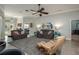 Spacious living room with comfortable seating, neutral decor, and ample natural light at 633 Hart Lake Dr, Winter Haven, FL 33884