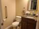 Powder room featuring granite countertop at 700 E Park Rd, Haines City, FL 33844