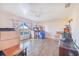 Bright and airy bedroom with wood-look tile floors and ample natural light at 700 E Park Rd, Haines City, FL 33844