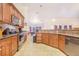 Well-equipped kitchen with granite countertops, stainless steel appliances and ample cabinet space at 700 E Park Rd, Haines City, FL 33844