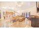 Open-concept living room with tile floors, modern furnishings and open to the kitchen at 700 E Park Rd, Haines City, FL 33844