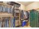 Organized walk-in closet featuring clothing racks and ample shelving space at 700 E Park Rd, Haines City, FL 33844